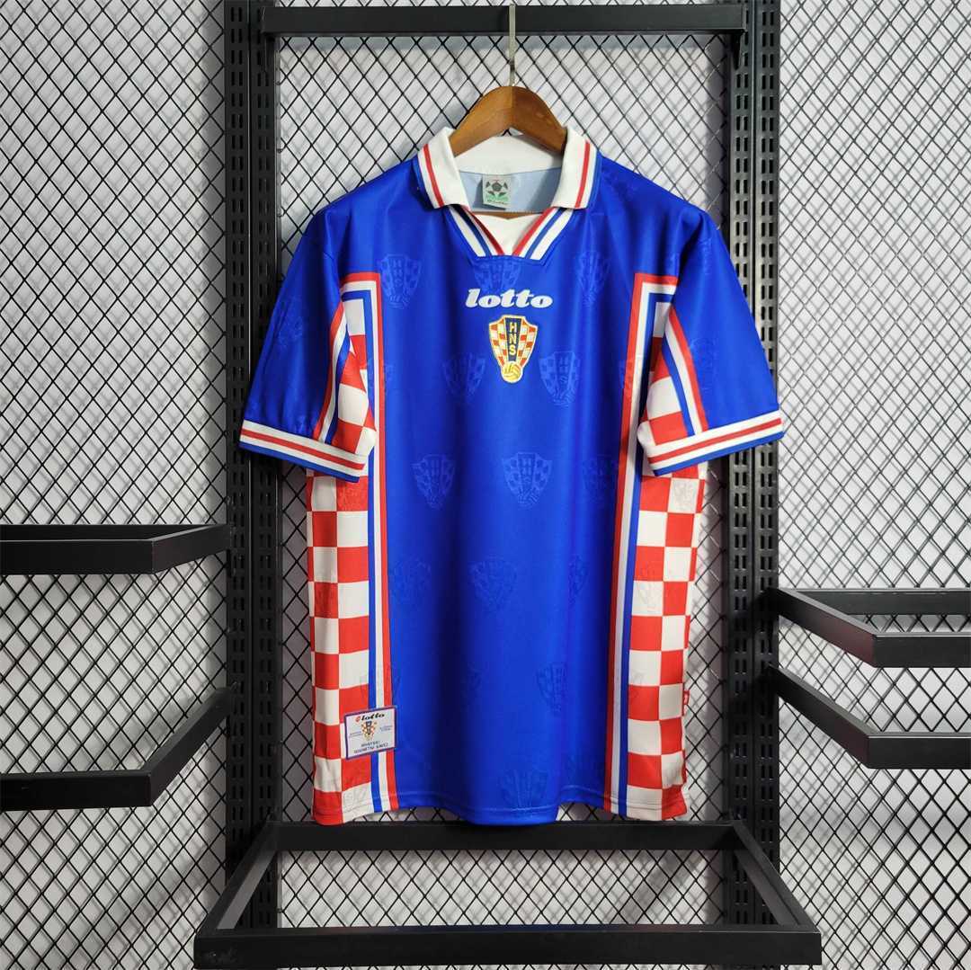 Retro Croatia 1998 away football shirt in blue with red and white checkered side panels, front view.